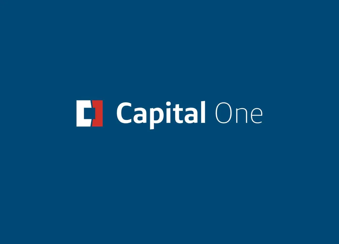 The redesigned Capital One logo in white on a dark blue background.