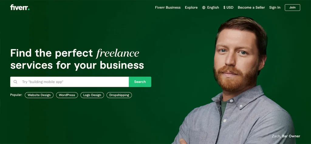Screenshot of the Fiverr home page with a search bar and a man.