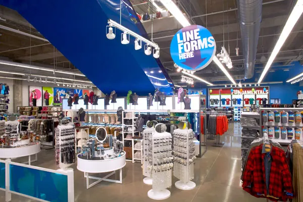 Interior of an Old Navy clothing store with bright displays and signs.