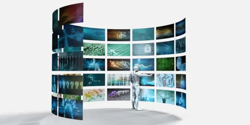 A man stands before a curved wall of glowing video screens.