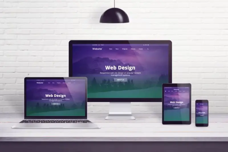A responsive website shown on a desktop, laptop, tablet and phone.
